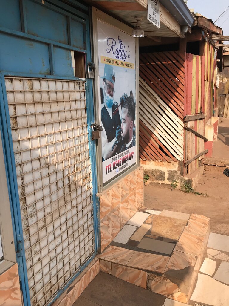 Car dealership Randy’s Hair Cut, Earth, photo