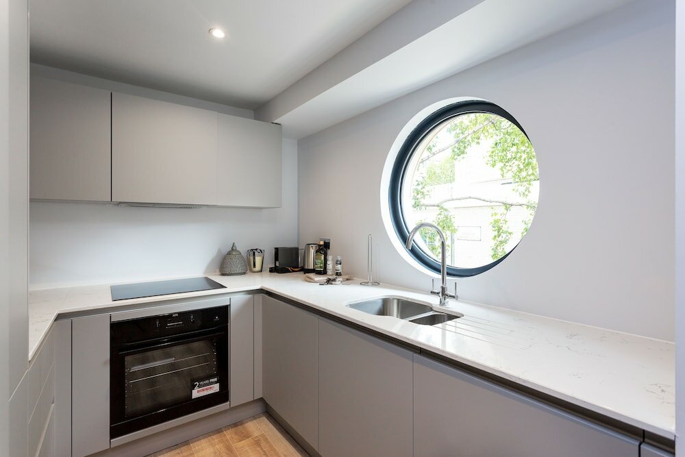 Фото The Carlyle - Elegant Serviced Apartments