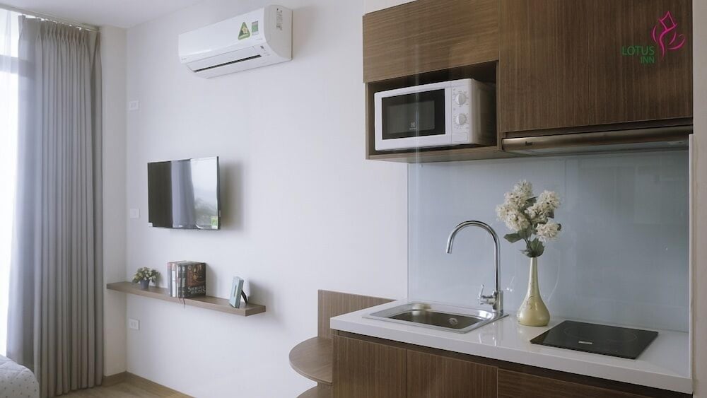Фото Lotus Inn Serviced Apartment