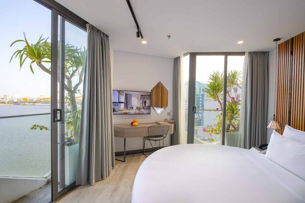 Фото Haian Riverfront Hotel Da Nang