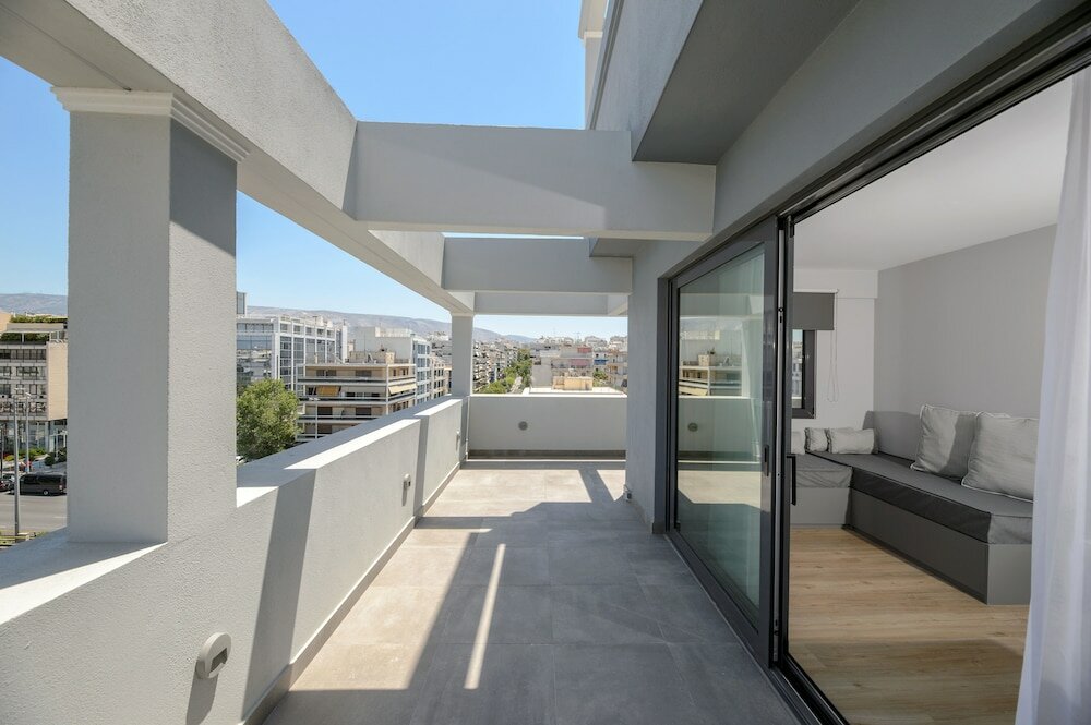 Фото The Convo Syngrou Apartments