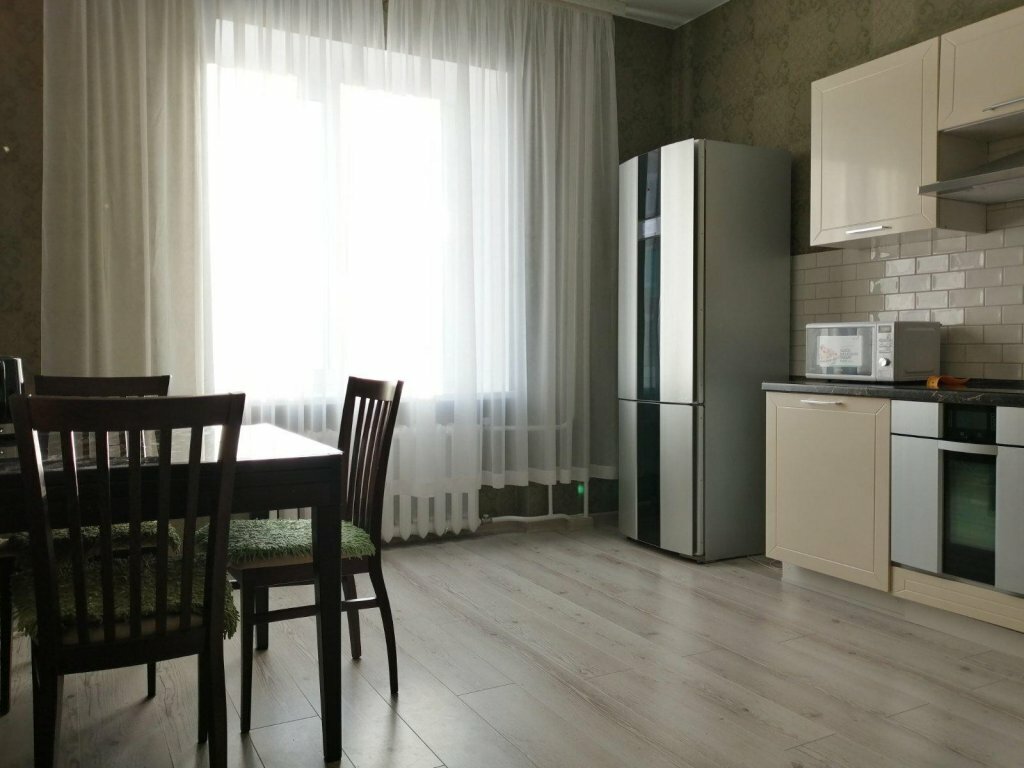 Short-term housing rental Atmosfera Komforta Valerii Gnarovskoy 12/7 Apartments, Tyumen, photo