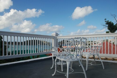 Гостиница At Home in the Tropics B&b