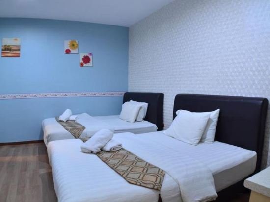 Фото Hotel Zamburger Sungai Besi