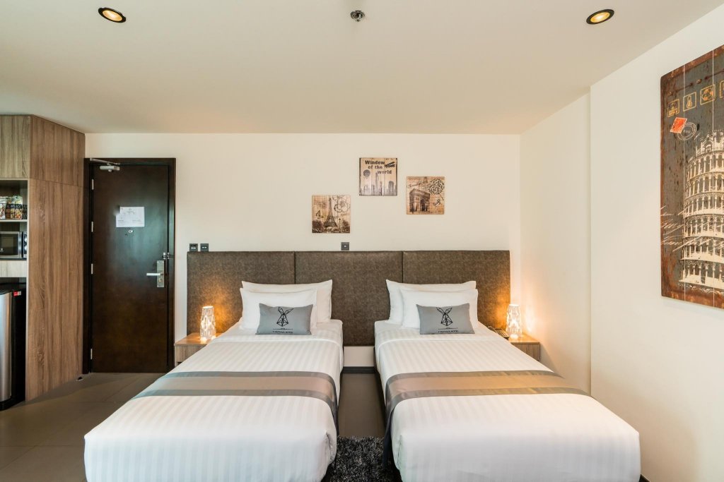 Фото T Pattaya Hotel