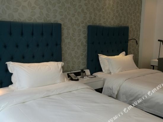 Фото Shanghai Jinchen Hotel