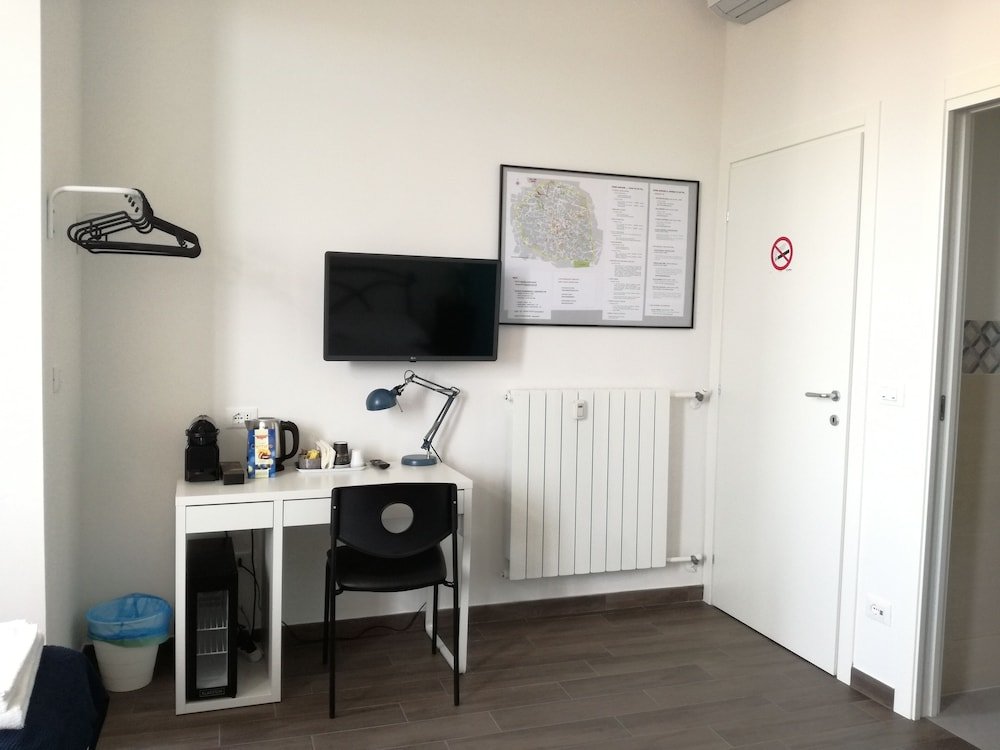 Фото Mambo Suites