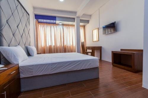 Фото Metro Port City Hotel