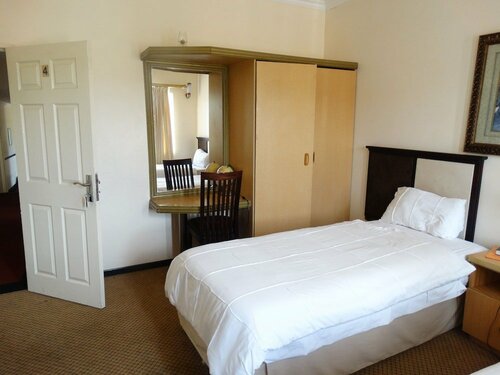 Гостиница Global Village Guesthouse в Манзини