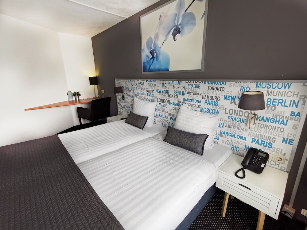 Фото Strandhotel Het Hoge Duin