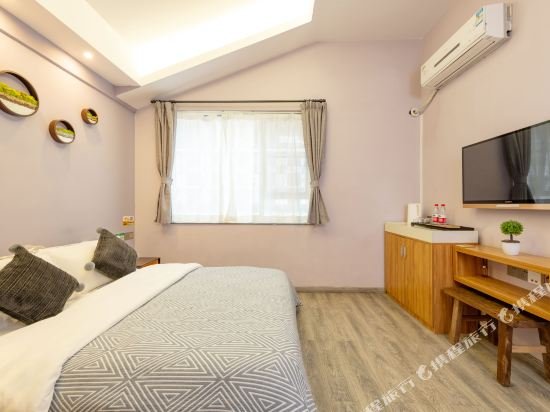 Фото Spring Blossoms Inn Yangshuo West Street