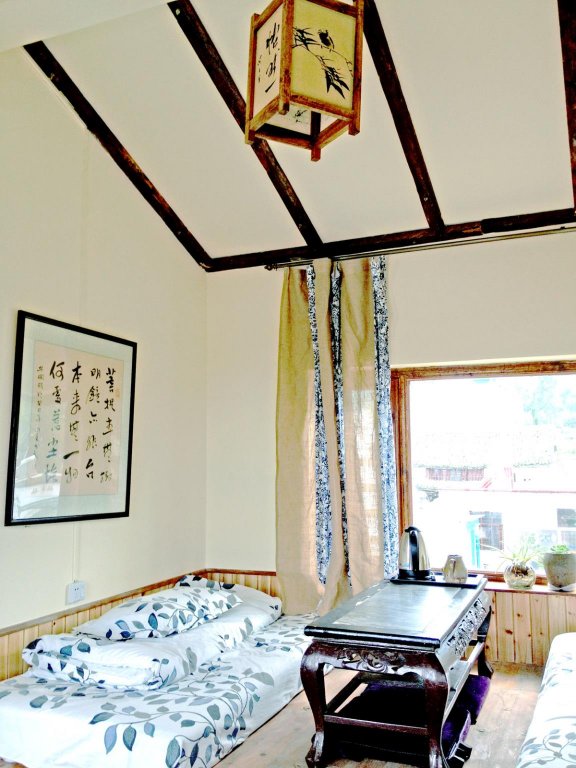 Фото Dali Lily Pad Inn & International Guest House
