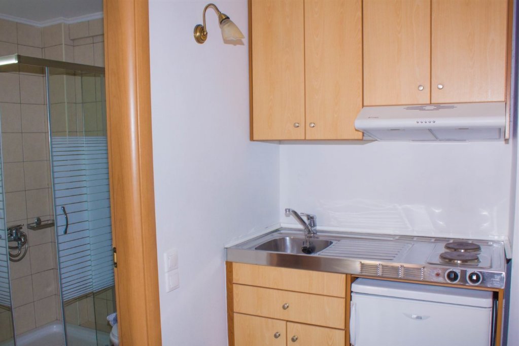 Фото Sunshine Studios & Apartments