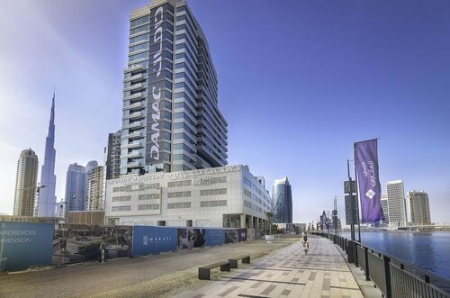 Апартаменты Oskena Vacation Homes - Damac Maison Canal View в Дубае