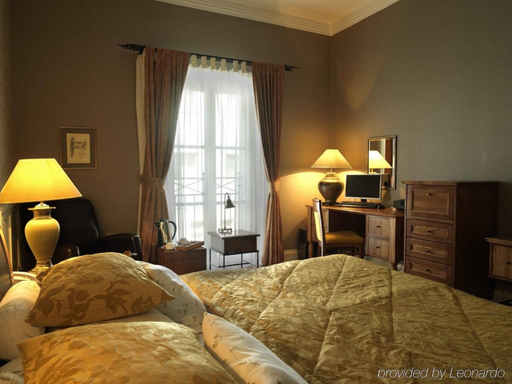 Фото Marrol's Boutique Hotel