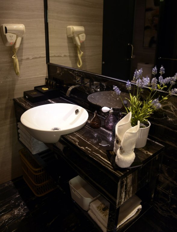 Фото La Perle International Hotel