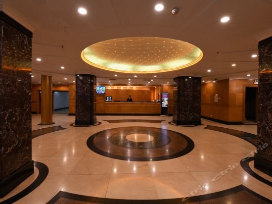 Фото Xinghua Hotel
