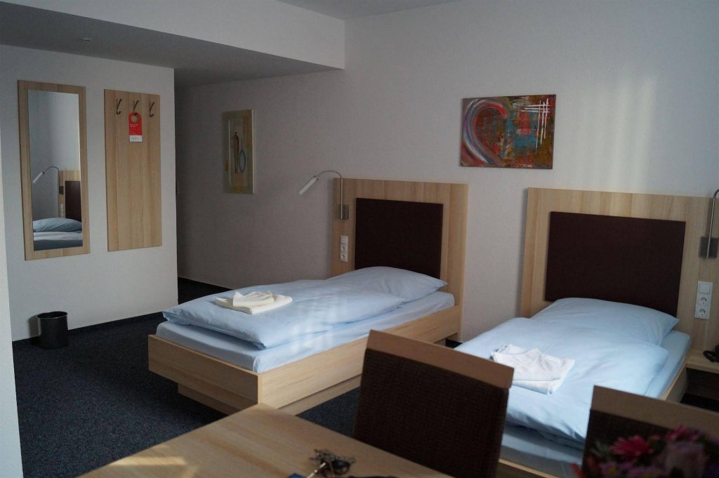 Фото Hotel Am Vogelsanger Weg