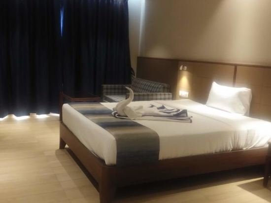 Фото Cosmique Clarks Inn Suites, Goa