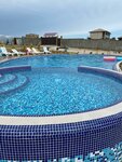 Guest House Mega (село Миндальное, СНТ Солнечная Долина, Лавандовая улица, 129) ، فندق