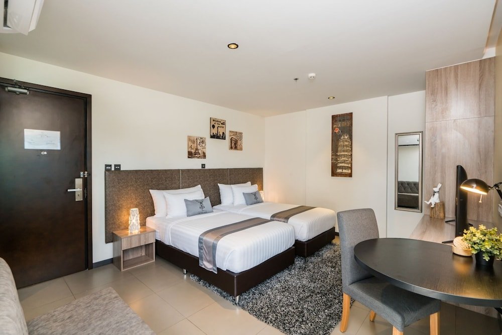 Фото T Pattaya Hotel