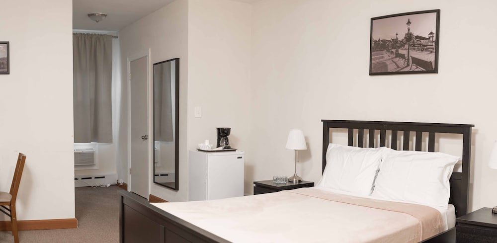 Фото Moon Inn Hotel