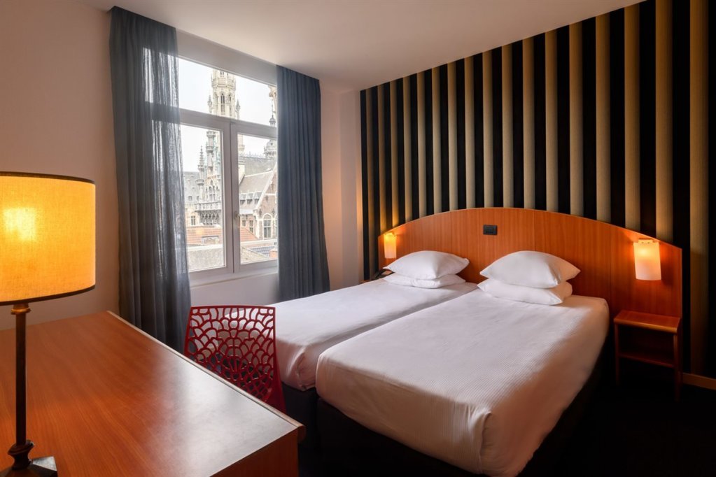 Фото Aris Grand-Place Hotel
