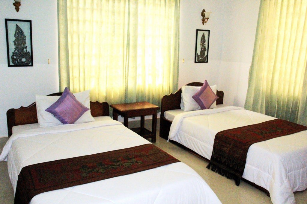 Фото Tropical Breeze Guesthouse