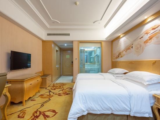 Фото Vienna International Hotel - Ningbo City West Xintiandi