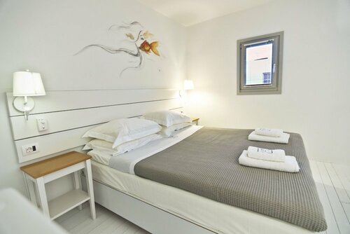 Гостиница Lindos Comfy Suites в Линдосе