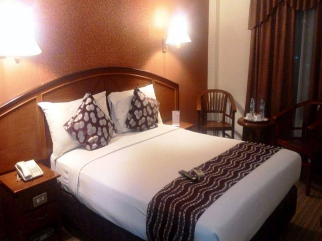 Фото Mega Matra Hotel