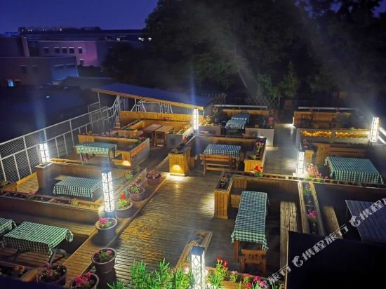 Фото Happy Dragon Saga Hotel (Beijing Tiananmen Wangfujing)