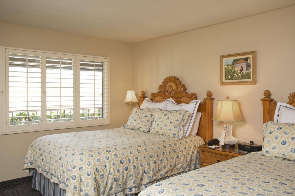 Фото Franciscan Inn & Suites