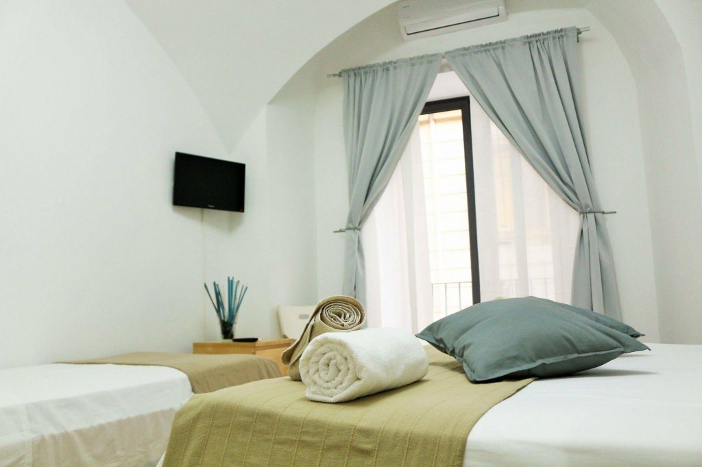 Фото B&B Maison Du La Rua