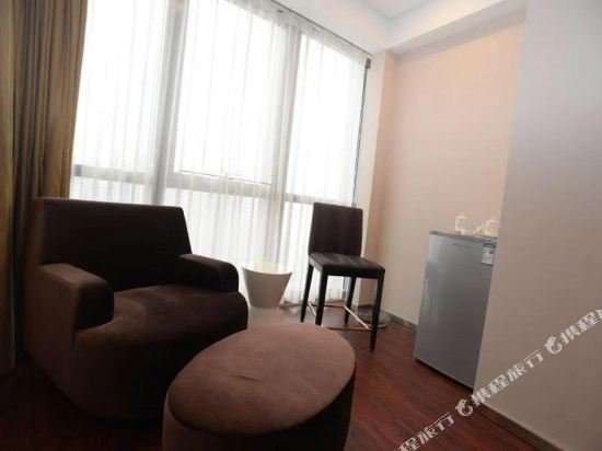 Фото Qingdao Housing International Hotel