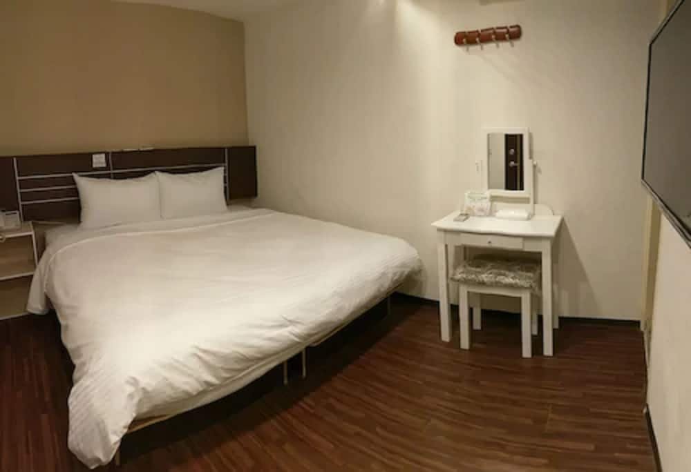 Фото Jhong-Sing Hotel