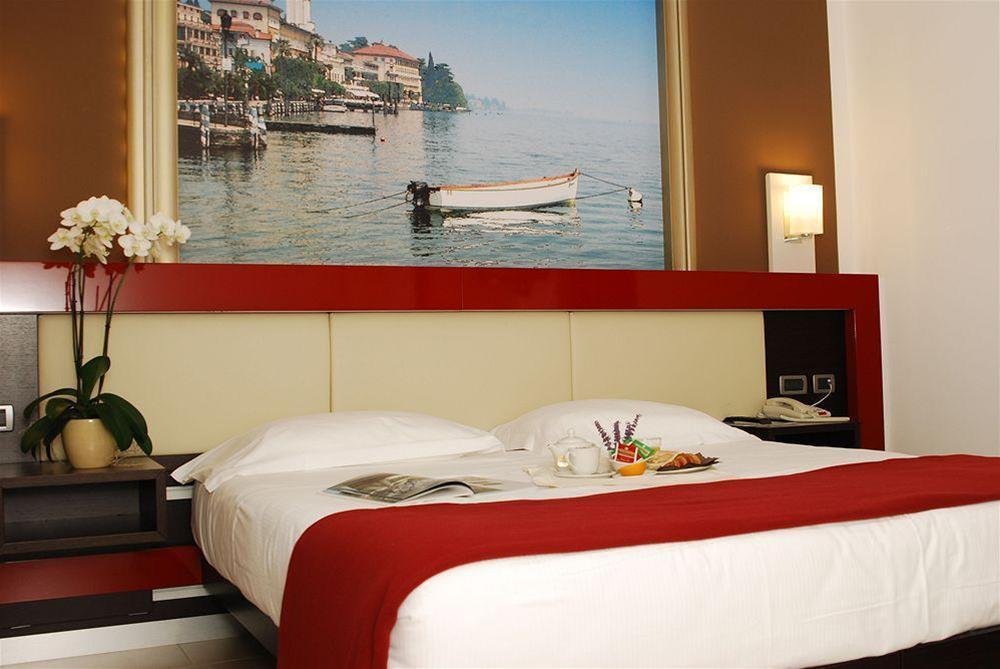 Фото Kairos Garda Hotel