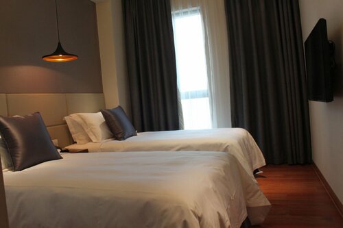 Внешний вид отеля Modena by Fraser New District Wuxi в Уси, фото 2