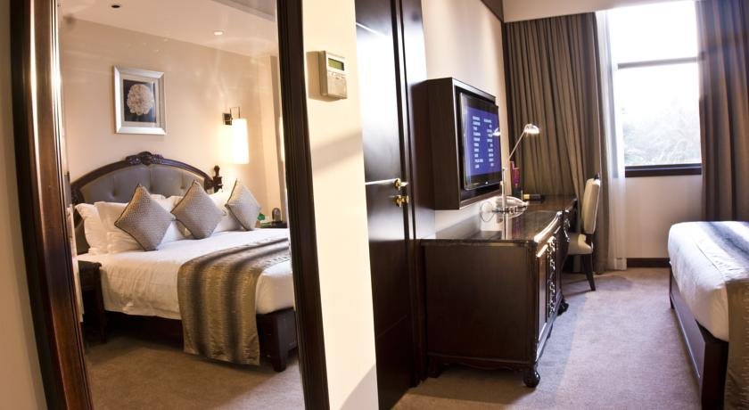 Фото Tang Palace Hotel