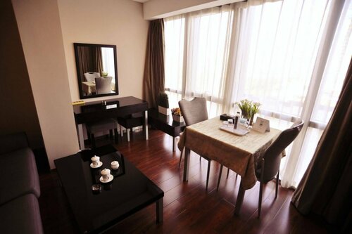 Гостиница Qingdao Housing International Hotel в Циндао