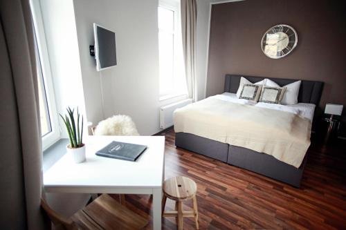 Фото Stadthaus by Hentschels Apartments