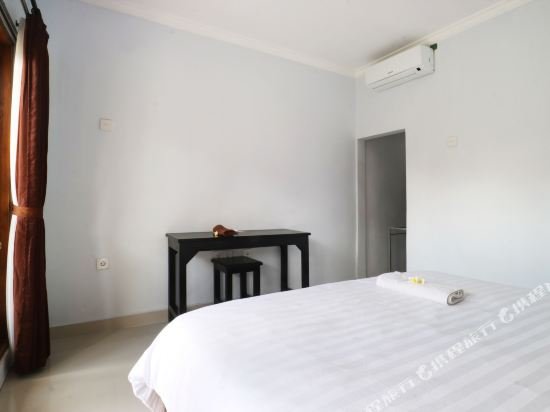 Фото The Wina Echo Beach Guesthouse