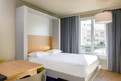 Гостиница Aparthotel Adagio Access La Defense Puteaux в Пюто