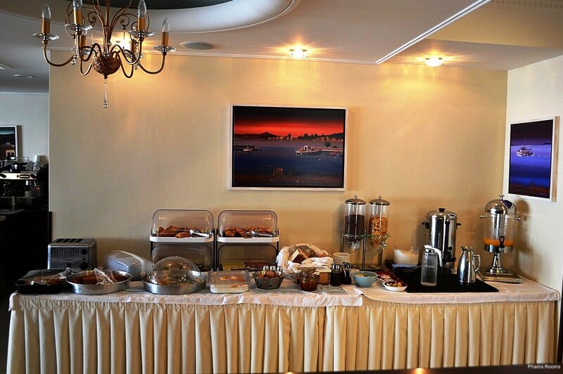 Фото Отель Pharos Rooms