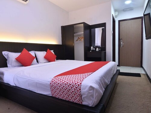 Гостиница Oyo 43960 Laksamana Executive & Boutique Hotel в Тавау