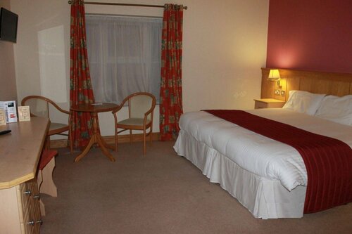 Внешний вид отеля Mahons Hotel в Ирвинтауне, фото 5