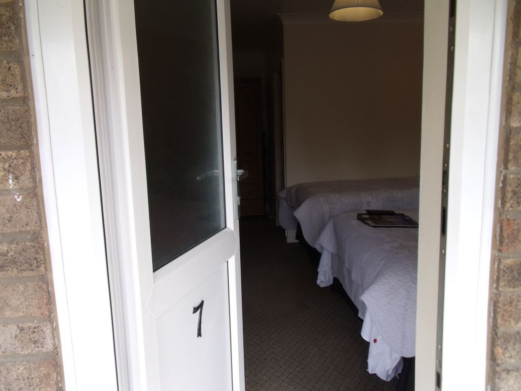 Фото The New Inn Motel