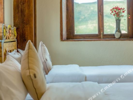 Фото Shangri La E Outfitting Boutique Hotel