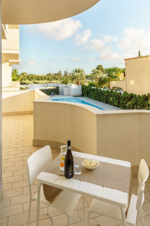 Фото Travini Hotel Residence