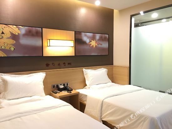 Фото Iu Hotels·Shangri-La Bus Terminal Songzanlin Temple